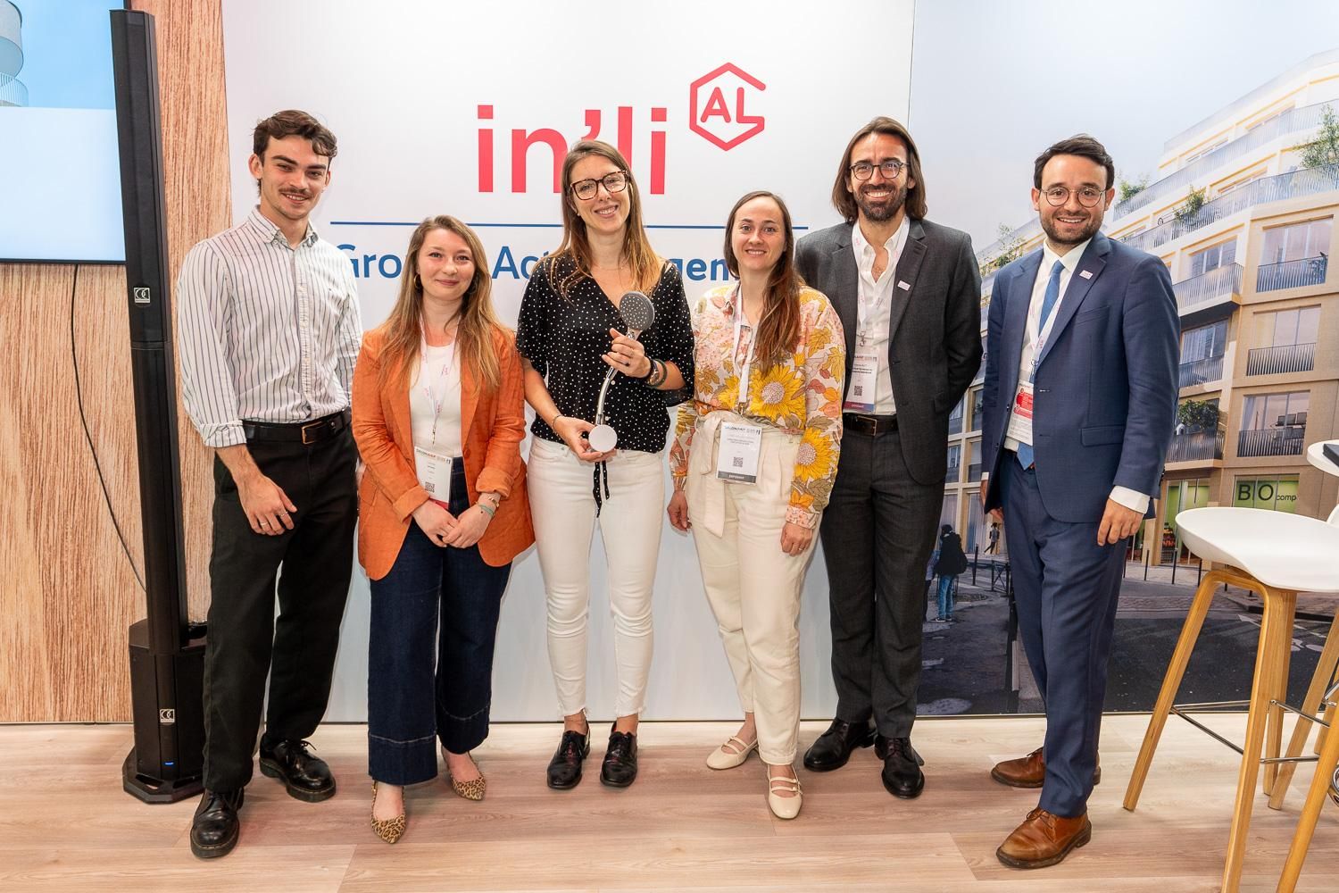 L'équipe Molleau et in'li (groupe Action Logement) réunies sur le stand au Salon de l'AMIF 2026, autour du Molleaumètre